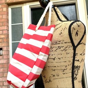 Corral and White stripped tote, with rope handles.